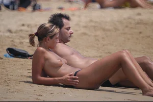 Girls on a nude beach in Bibione, Italy