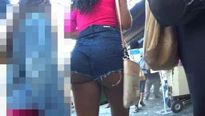 Sexy black milf walking with a great ass in short jean shorts showing her ass cheaks