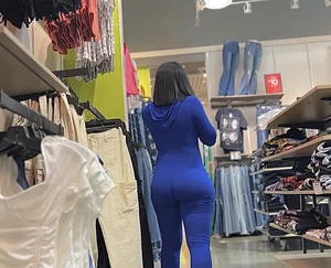 Thick mesmerizing ebony in a tight blue one piece