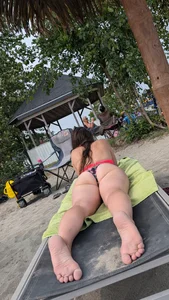 Bikini flower Bend over on the beach. OC