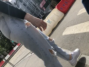 Awesome booty in ripped tight jeans street photos