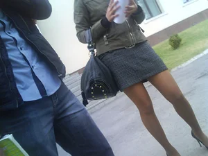 Milf in Pantyhose on High Heels in a Skirt on the City Street Legs Closeup Creepshot