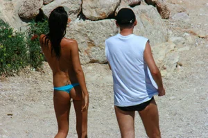 Ula FKK Sexy brunette on a nude beach topless, bottomless and with blue thong