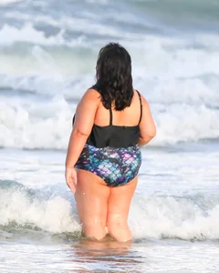 Extra thick girl at the beach in a bikini