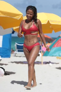 Christina Milian in red bikini in Miami with hard nipples