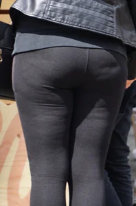 Red haired girl with a thick booty in tight leggings