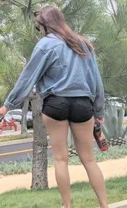 Walking the Dog in Tight Black Shorts