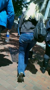 Blonde in tight jeans with her red thong sticking out