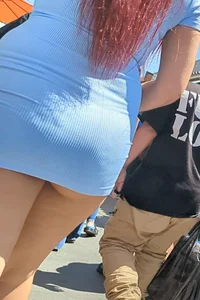 Sexy Redhead showing butt cheeks in dress (OC)