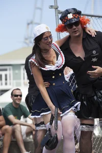 Girl in sailor costume flashes her tits quickly