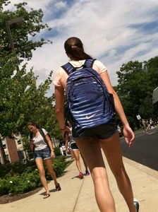 Hot college girl in little jean shorts showing some cheeks and legs