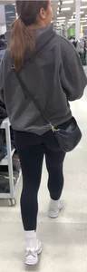 Perfect round ass showing off her long socks and black leggings