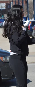 Thick brunette with a big booty in tight black leggings