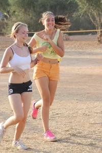Candid track girls and runners