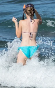 Another sexy girl on the beach snorkeling