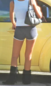 Skinny babe going to her car in little cotton shorts
