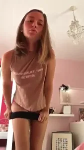 Hot non-candid girl showing her panties in her bedroom