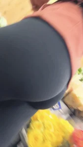 asian round booty looking for flowers at Trader joes