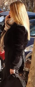 Tiny blonde in black pants
