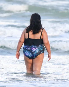 Extra thick girl at the beach in a bikini