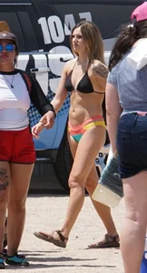 Girls in bikinis getting ready for tubing
