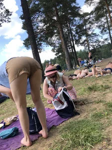 Barefoot Candid Girl in Shorts Bending Over at the Beach Unpacking Her Things Before She Undresses Creepshot