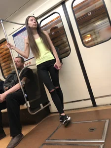 Skinny Candid Girl With Slim Legs in Torn Black Jeans - Subway Train Creepshots