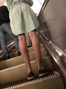 Girl in a Dress With Sexy Legs in Subway and on a Street