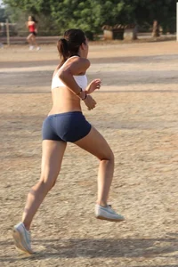 Candid track girls and runners