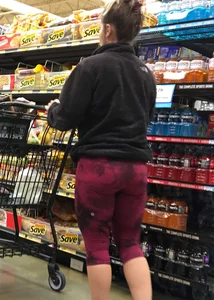 Milf grocery shopping in red leggings with a great ass