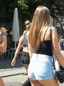 Sexy ass girl walking with friends in short shorts showing her nice ass cheeks