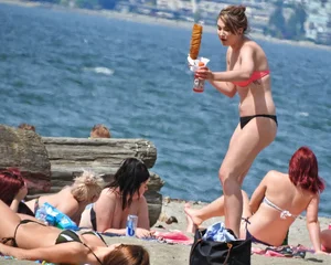 Group of sexy girls in bikinis at the beach