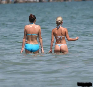 A bunch of sexy beach voyeur babes in bikinis, thongs and topless