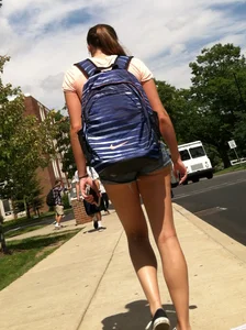 Hot college girl in little jean shorts showing some cheeks and legs