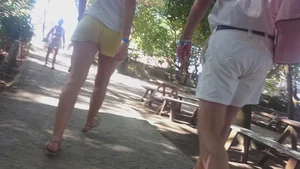 Milf in yellow shorts with vpl and a wedgie
