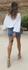 Flat ass leggy girl in denim shorts