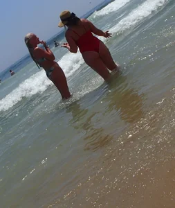 Thick big booty girl in a swimsuit with blonde friend in a bikini