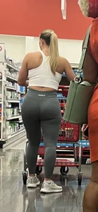 Amazing ass on shopper in leggings