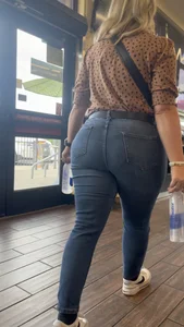 Pawg blonde filling out jeans. Slight VPL