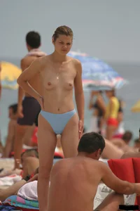 Beach voyeur girls in bikinis, thongs and topless