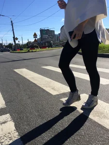 Blonde Girl With Fit Muscular Legs in Tight Black Jeans and Sneakers on a Crosswalk  - Street Creepshots Collection