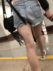 Tall Candid Teen Girl in Denim Shorts and a Top With an Injured Knee Subway and Street Creepshots - Hot and Muscular Long Legs