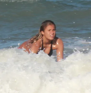 Hot surfer chicks out in the water
