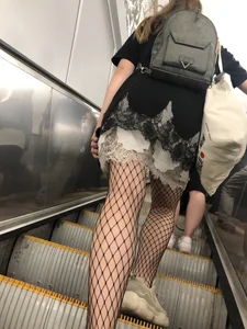 Cute Girl in Lacey Semi-Transparent Dress and Fishnet Pantyhose Subway Escalator Candid Photos Gallery