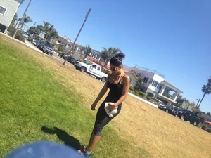 Hot brunette babe in leggings walking her dog with a nice ass and some cleavage