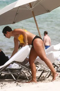 Frankie Bridge nip slips in a bikini on the beach
