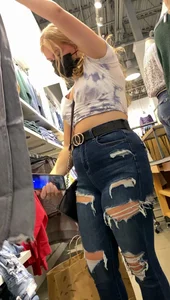 Two blonde teens shopping