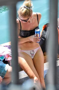 Blonde milf looking sexy in Hello Kitty bikini with nice mound and camel toe