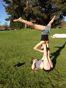 Girls Doing Gymnastics in the Park Candid Photo