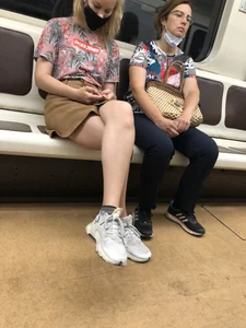 Amazing Hot Girl in a Skirt and Sneakers Sitting Cross-Legged in the Subway Train and on the Escalator Candid Photos Gallery